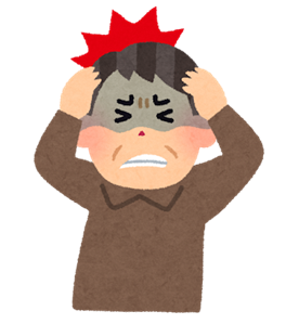 頭が痛そうな男性の画像